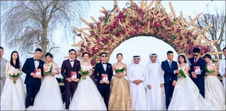 دبئی کی محبت جھیل پر 9 چینی جوڑوں کی اجتماعی شادی