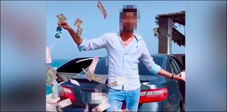 دبئی کی سڑک پر پیسے لٹانا ایشیائی شہری کو مہنگا پڑ گیا